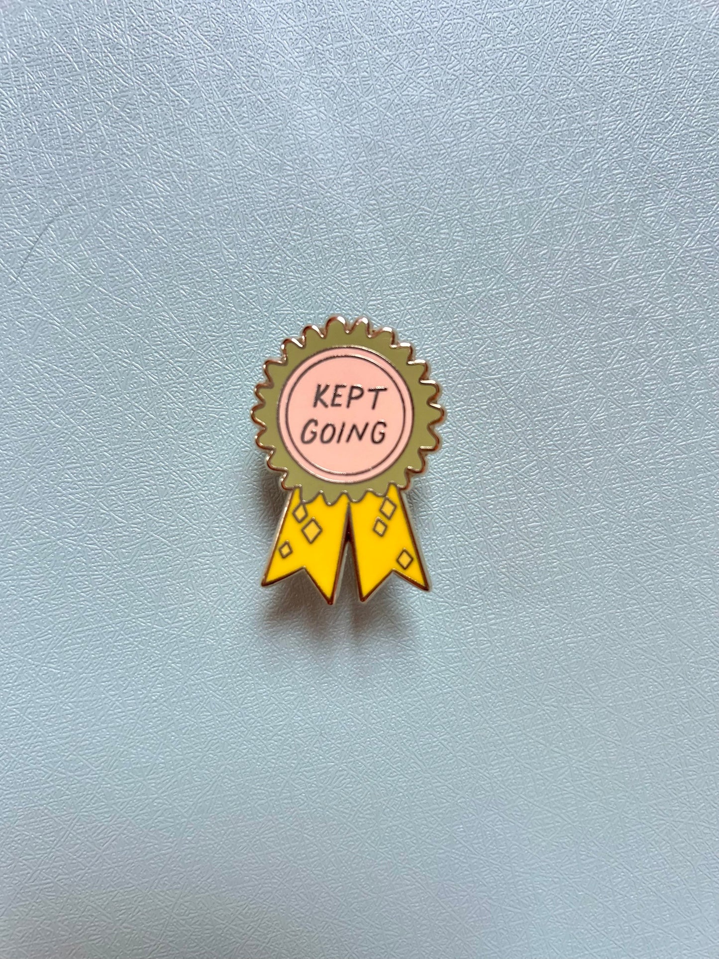 Kept Going Gold-Plated Enamel Pin